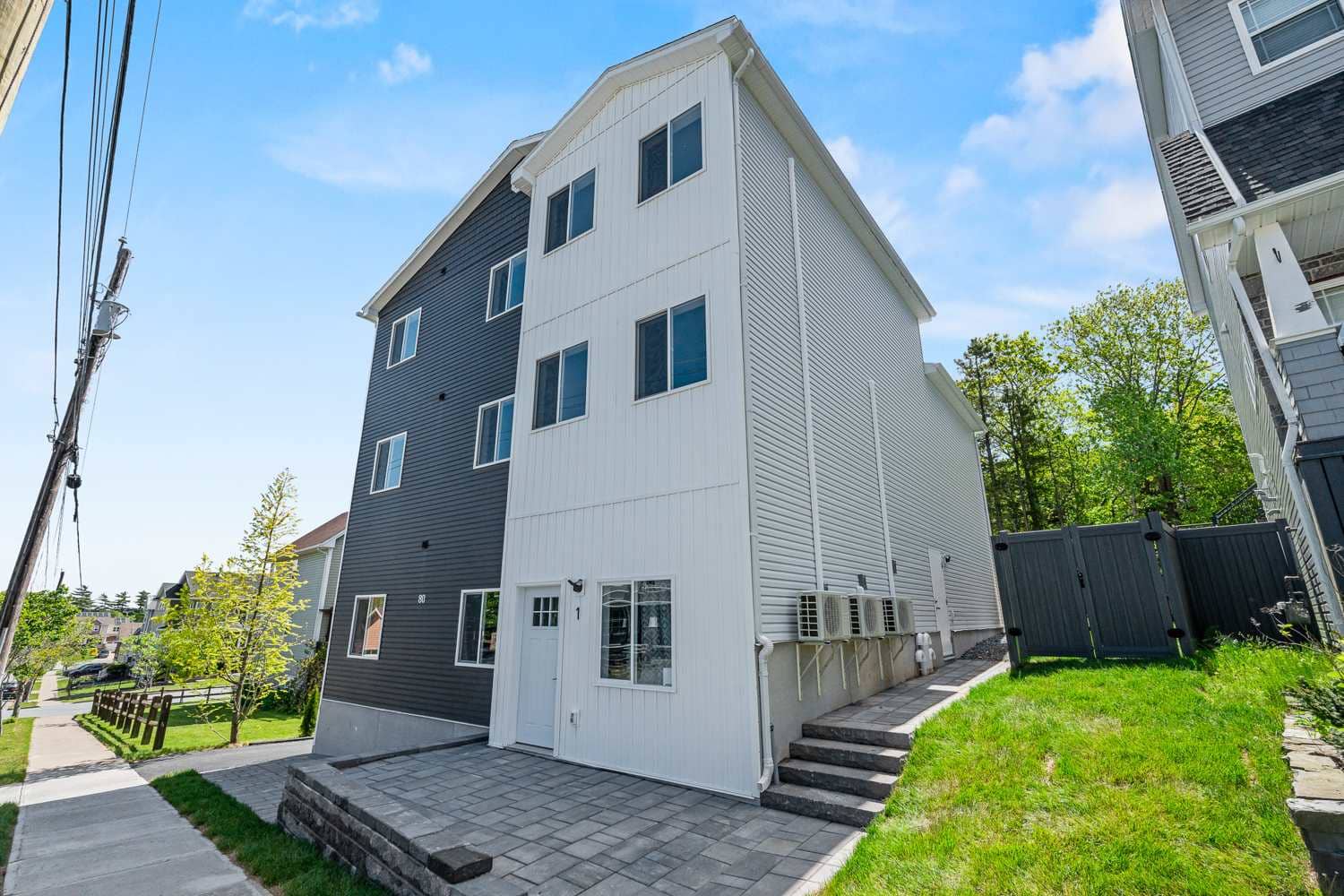 80 Cannon Terrace, Dartmouth: six units on one lot, finished in 2026 and built by Kulak Construction; a photograph from the street