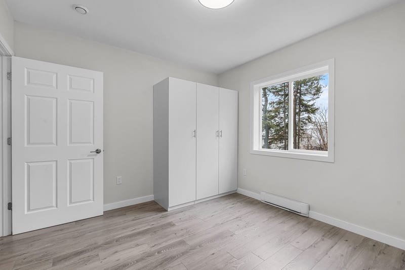 The first bedroom: the wardrobe and the window
